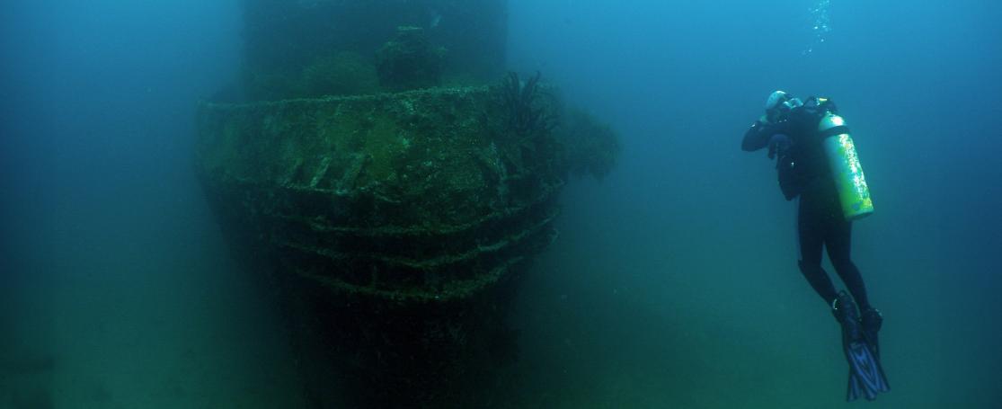 A diver and a sunken ship off the coast of Venezuela